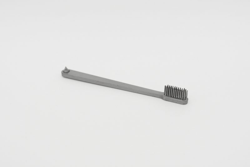 Yussef Hu | Metal Toothbrush | 2013 | Steel, lacquer | 16×1.5x1cm | (1280×856)