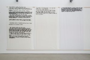 J Price | Sheets and Pages | 2015 | Hand carved letters printed onto curtain liner | 241x140cm